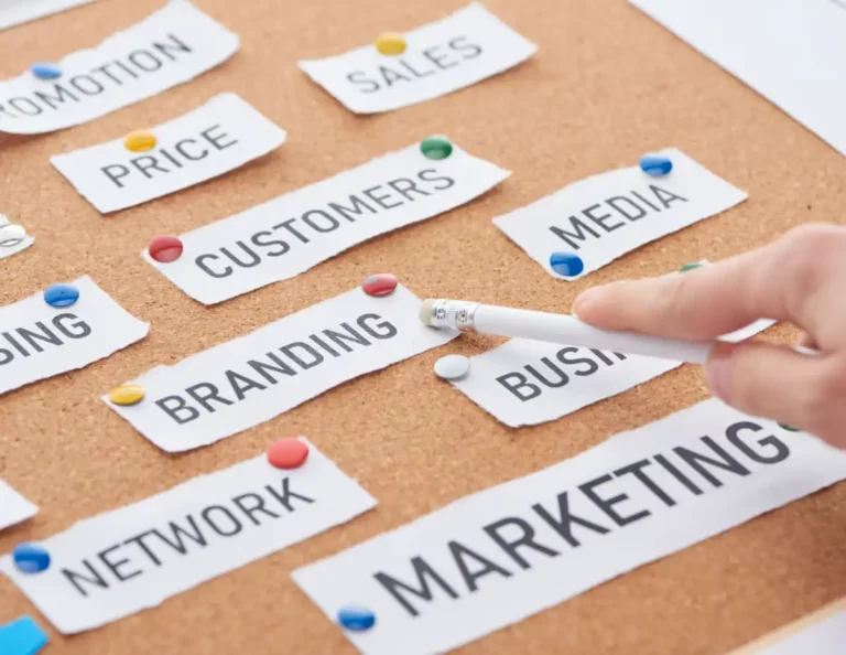 cropped-view-of-woman-pointing-with-pencil-on-bran
